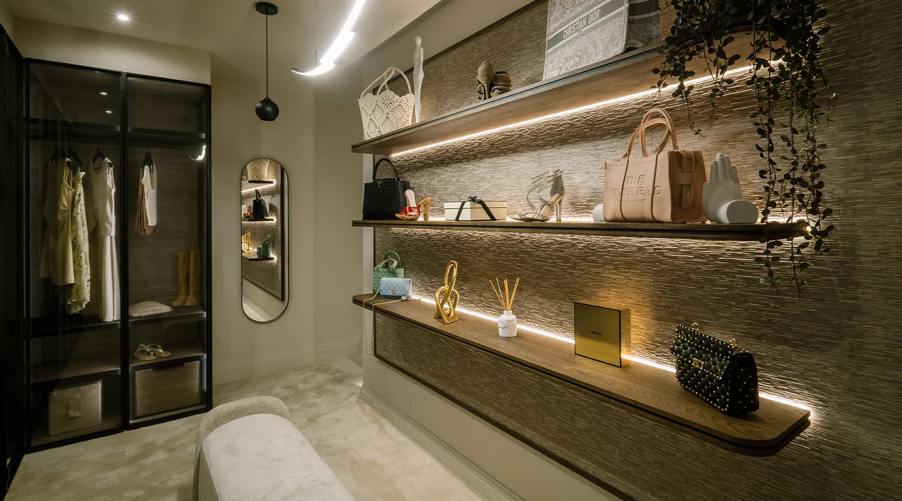 Beautiful dressing room at the House of Carvetii showroom displaying integrated bespoke furniture, lighting and flooring