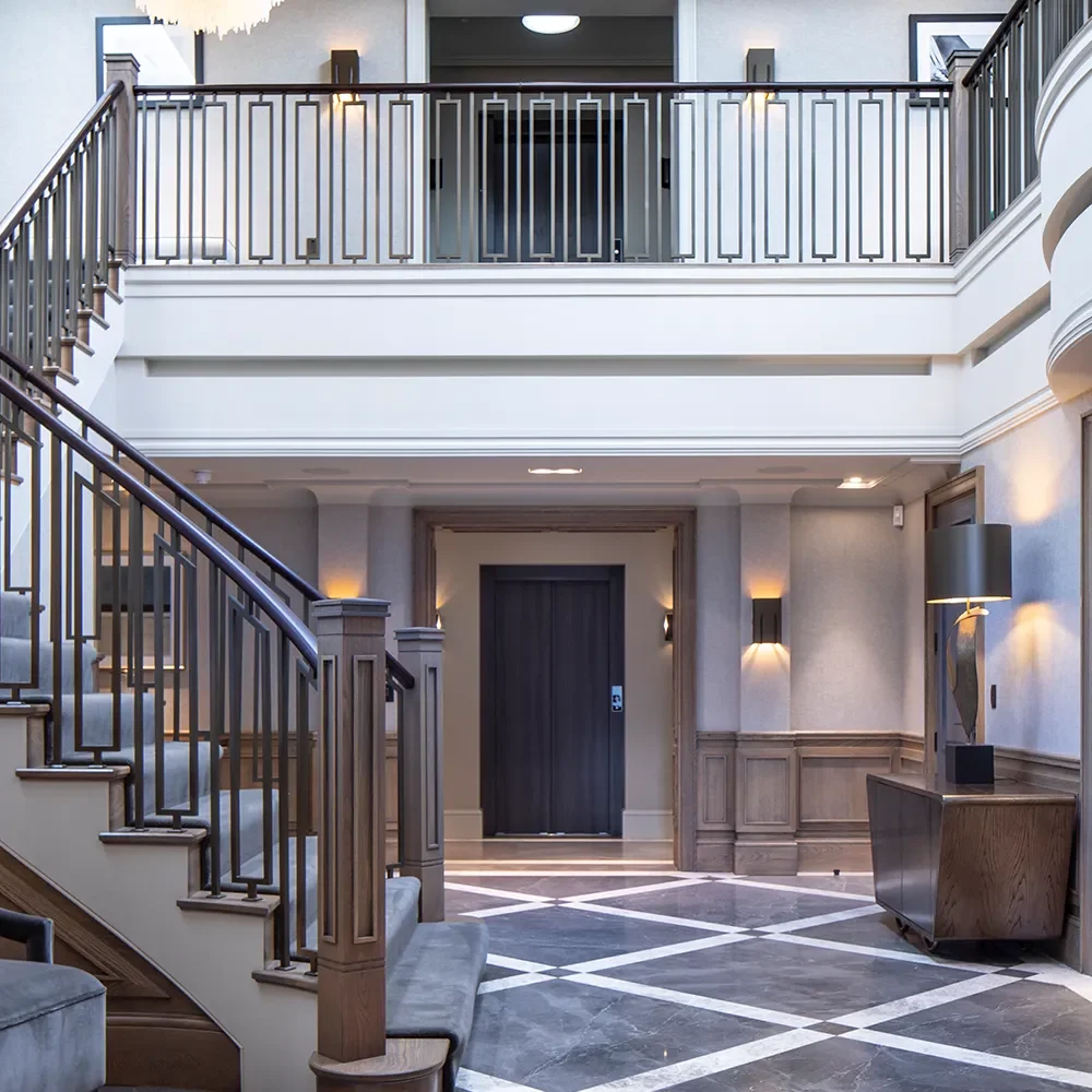 Interior staircase, landing and entrance hall with bespoke lighting design and control by Majik House