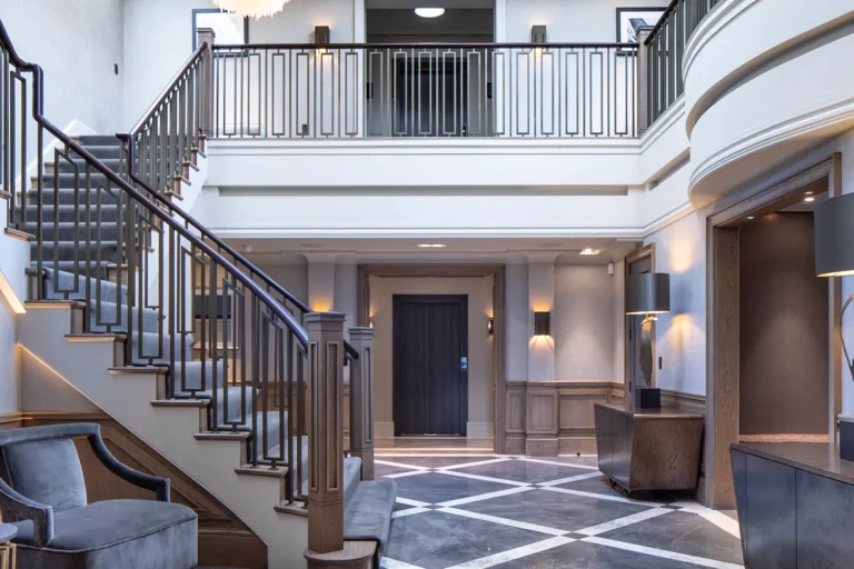 Interior staircase, landing and entrance hall with bespoke lighting design and control by Majik House
