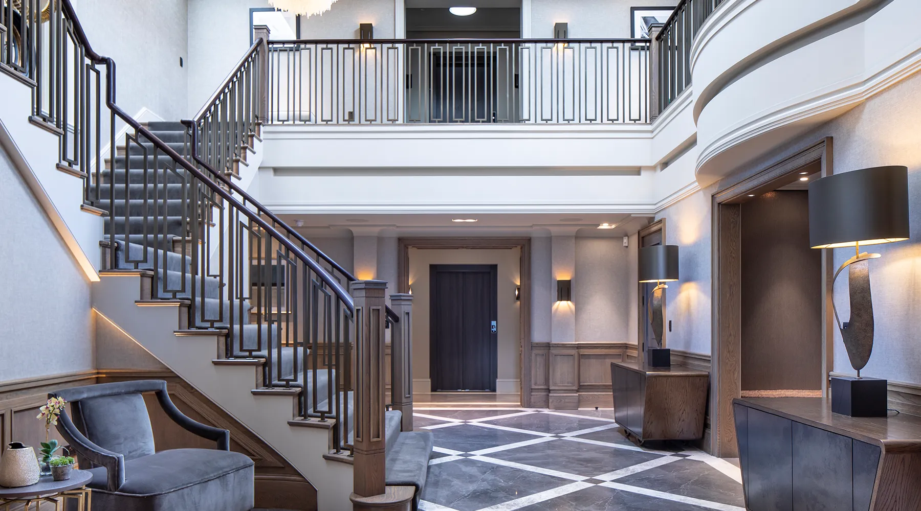 Interior staircase, landing and entrance hall with bespoke lighting design and control by Majik House